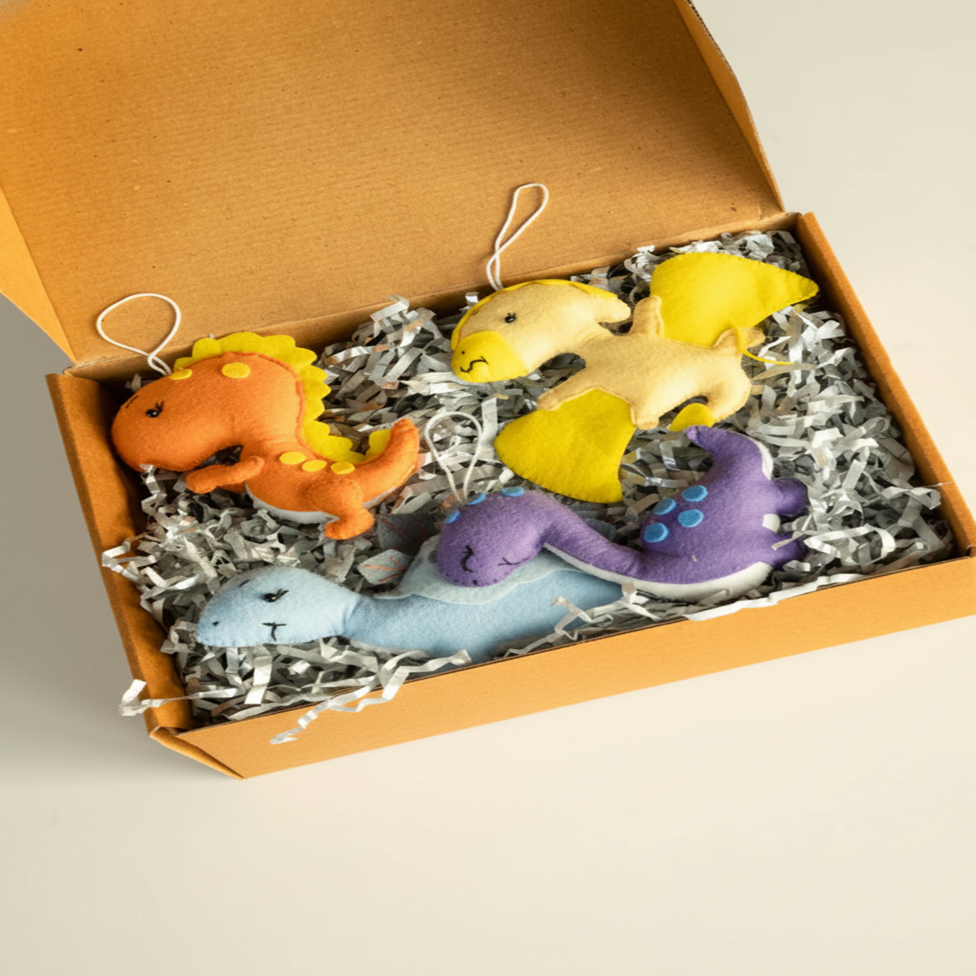 Dino felt charms